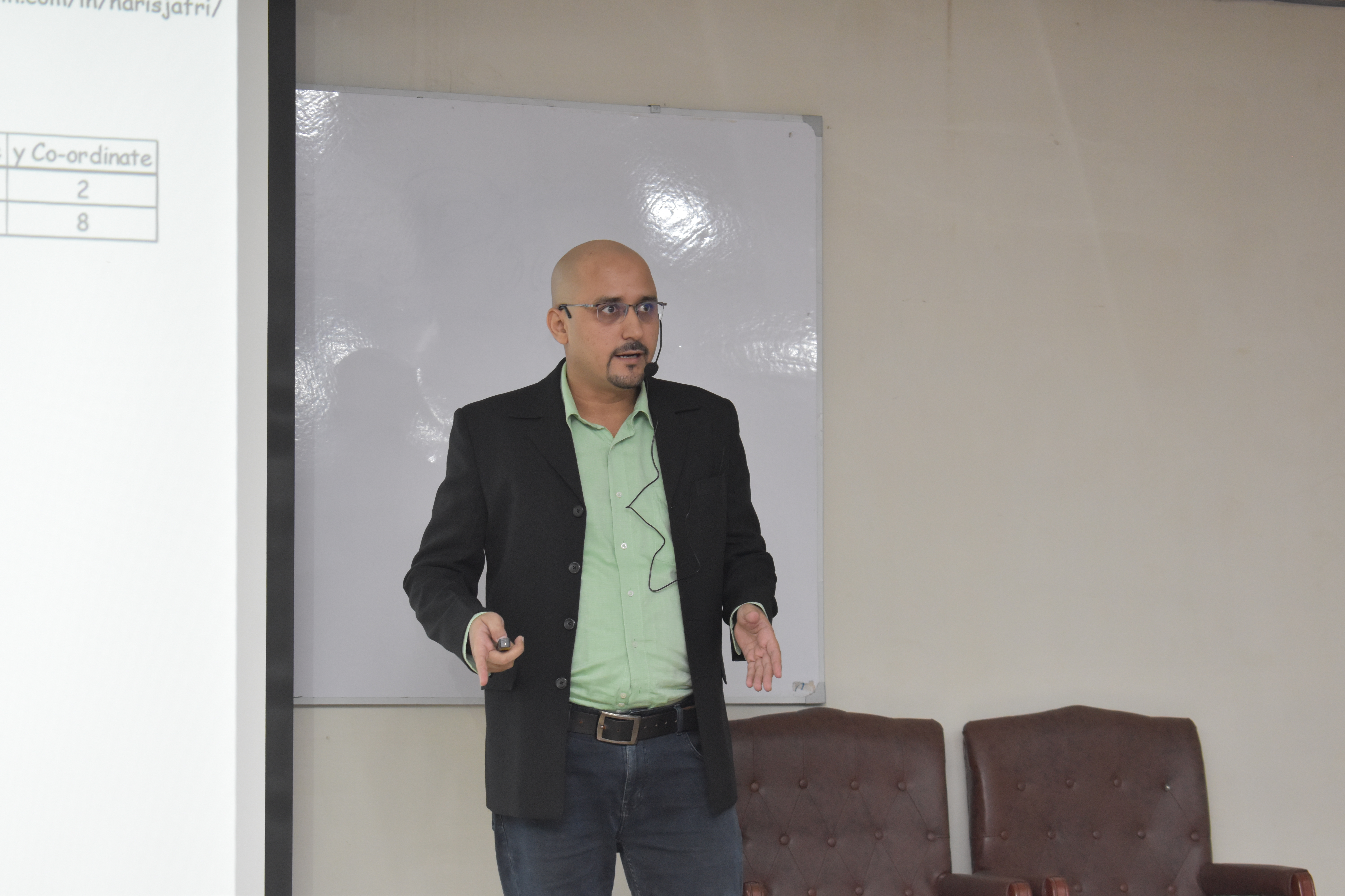 Haris Jafri leading a classroom session on coordinate geometry and analytical data modeling
